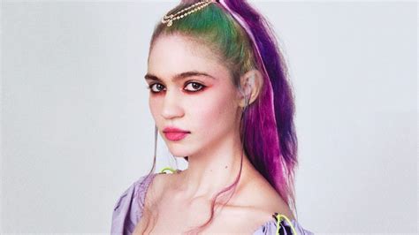 Grimes Reveals Shes Pregnant With Topless Photo 